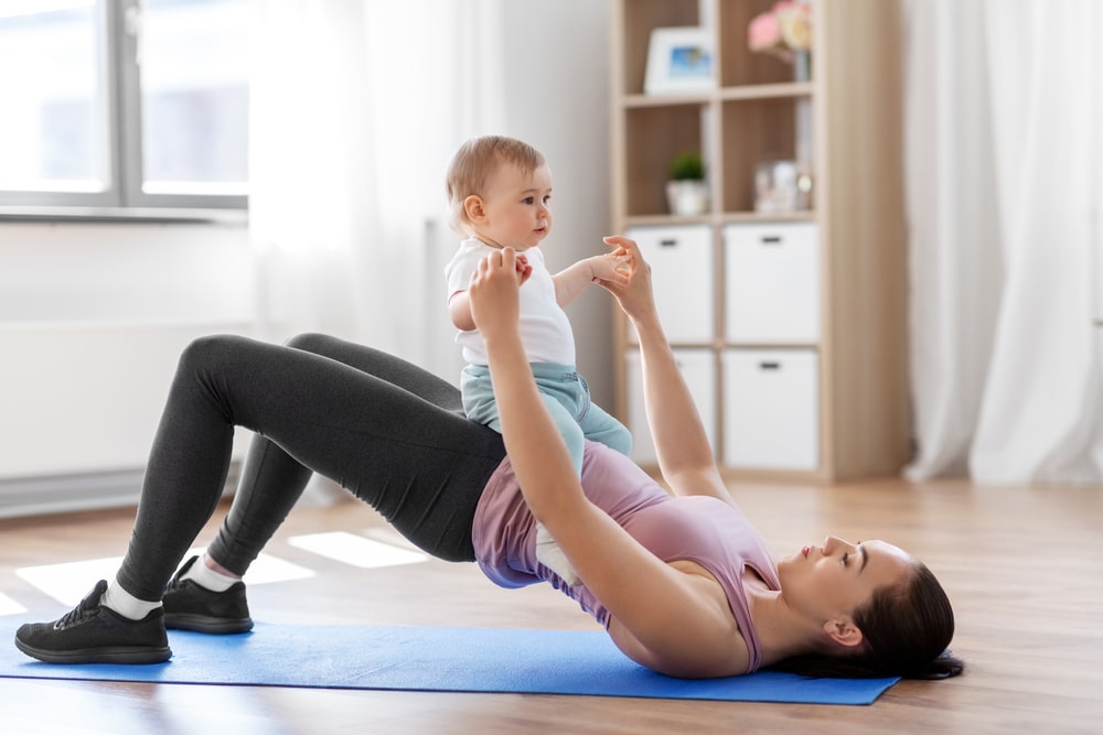 Family,,Sport,And,Motherhood,Concept,-,Mother,With,Little,Baby